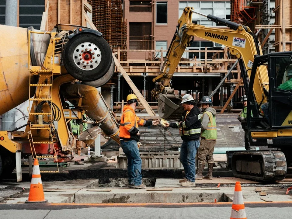 Choosing Contractor Handshake Building Plans