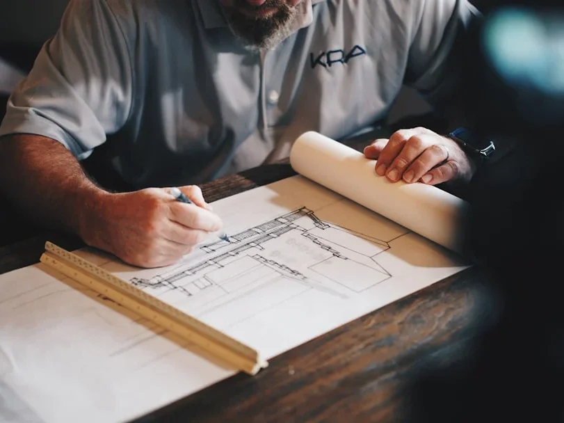 Construction Site Project Blueprint Handshake Deal
