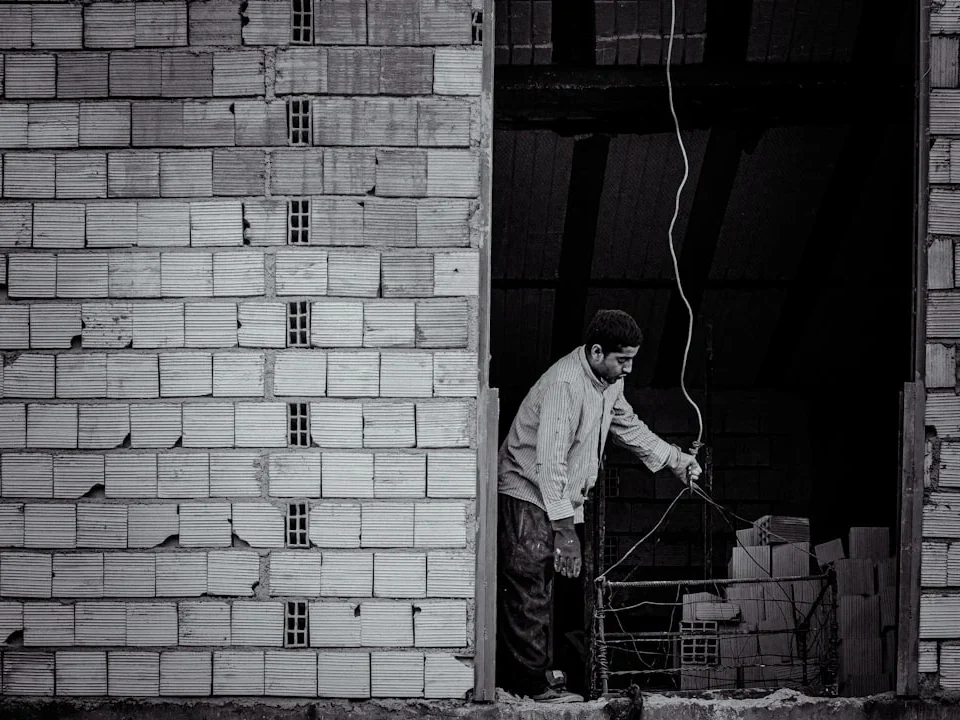Construction Worker Measuring Tape