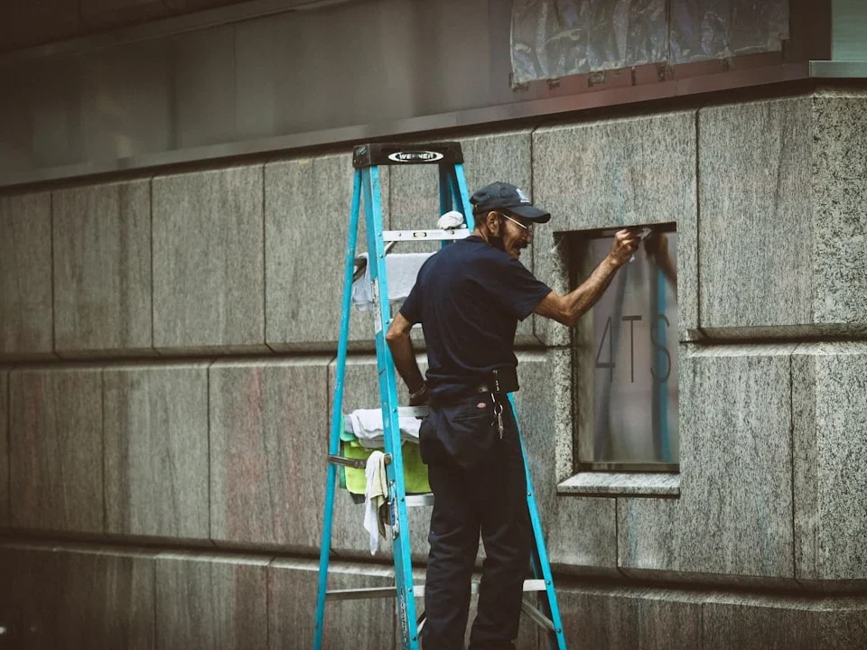 Construction Worker Window Installation