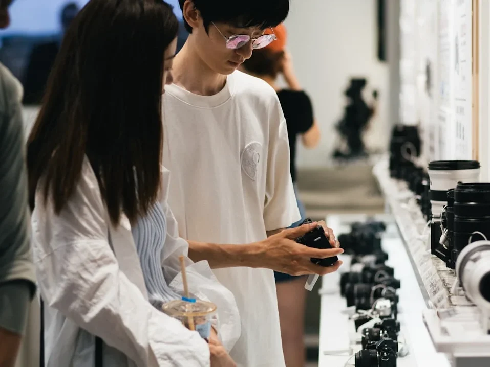 Person Choosing Magnifying Glass Quality Check