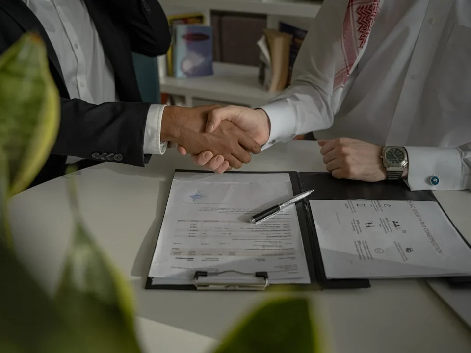 Construction Blueprint Handshake Agreement